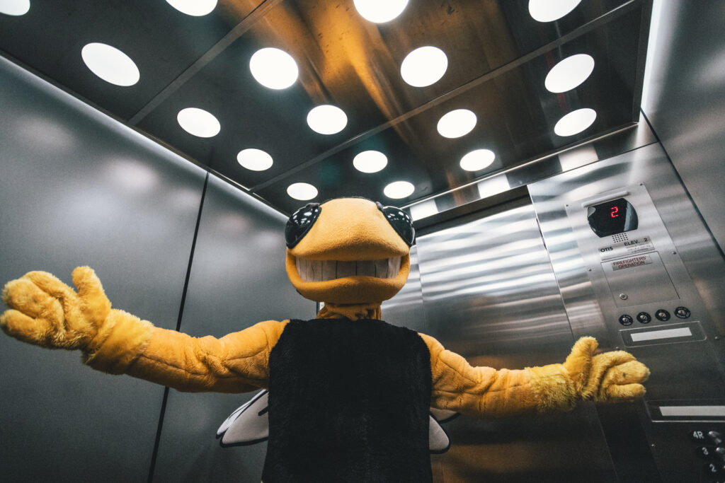 Mascot, Buzz, posing in an elevator