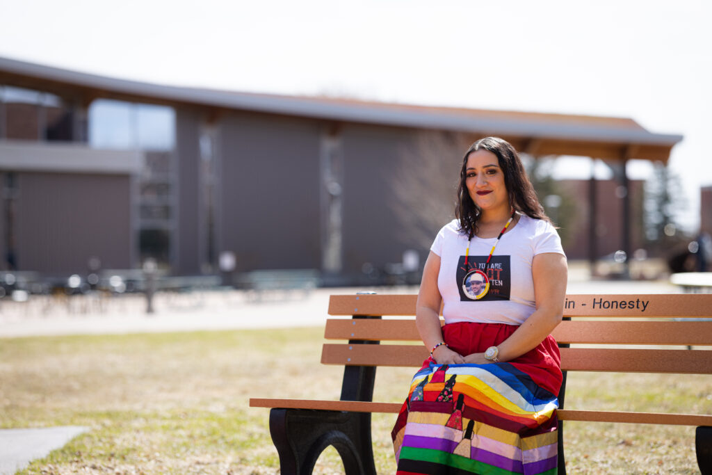 Student sitting on bench
