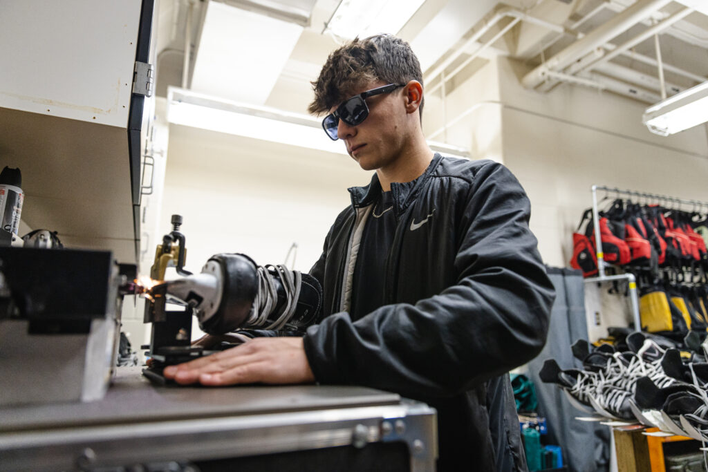 Student sharpening ice skates