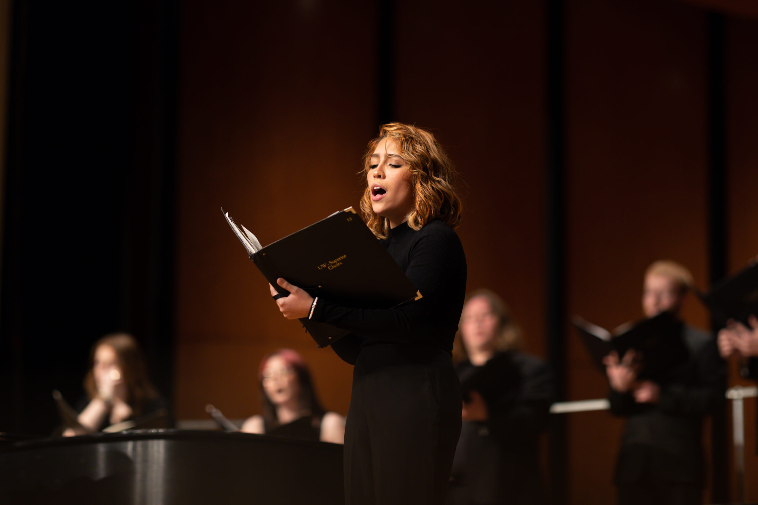Student performing at a choir concert