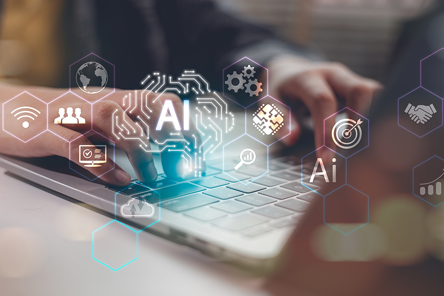 Hands typing on a laptop keyboard with transparent AI-themed icons, such as gears, a target, and a globe, digitally overlaid, symbolizing artificial intelligence and technology concepts.