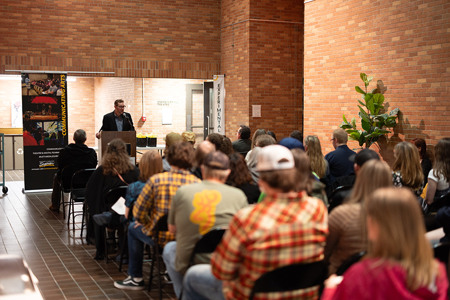Brent Notbohm, professor of film and video and chair of the Department of Communication, Media and Theatre, during the Communicating Arts Award Ceremony in the Holden Fine Arts Center.