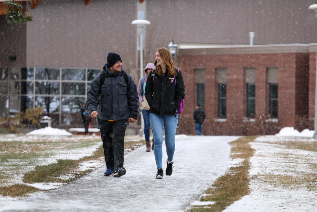 Students walking through snow