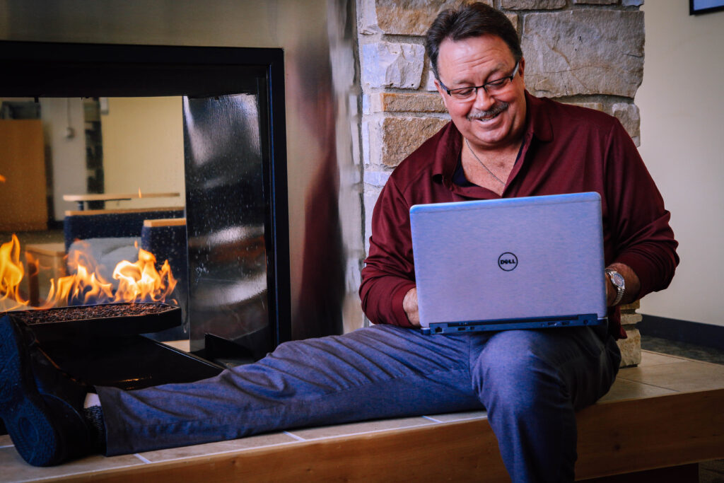 Adult student on his laptop