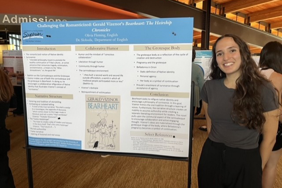 UW-Superior student Olivia Fleming presents research in the Yellowjacket Union.