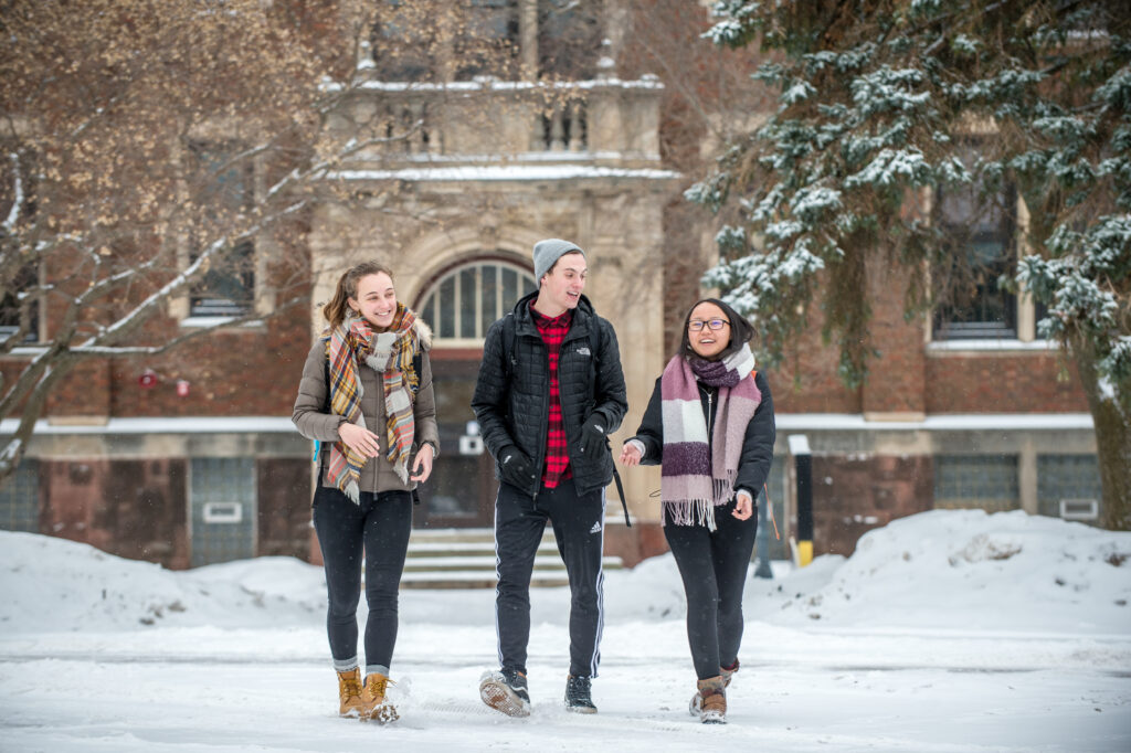 Students walking through snow
