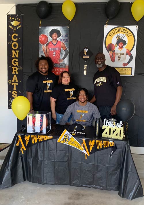 J'Vaun and family on signing day