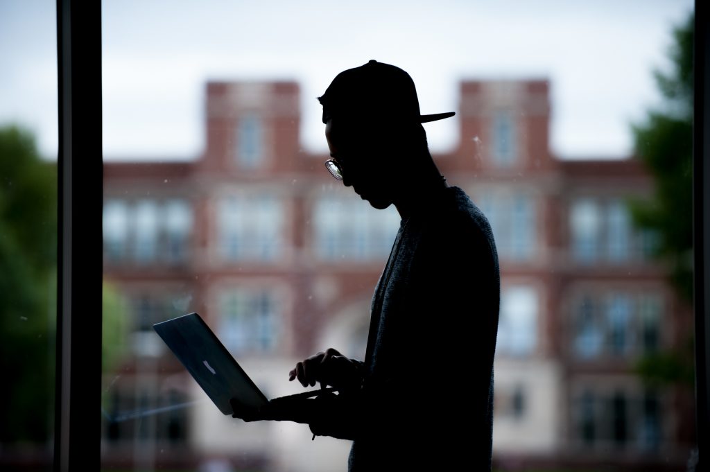 UW-Superior student working on a laptop